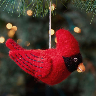 This is a red holiday decorations by Aahlada Chennupati called felt cardinal bird ornament in standard