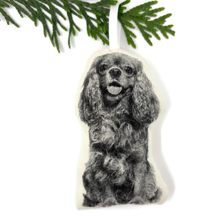 This is a beige holiday decorations by Broderpress called cavalier king charles ornament in standard