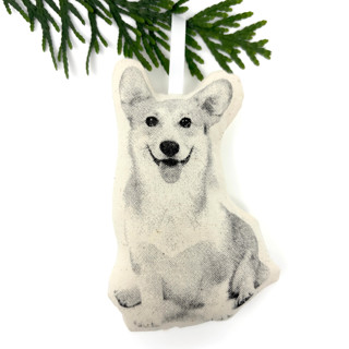 This is a beige holiday decorations by Broderpress called silkscreen corgi ornament in standard