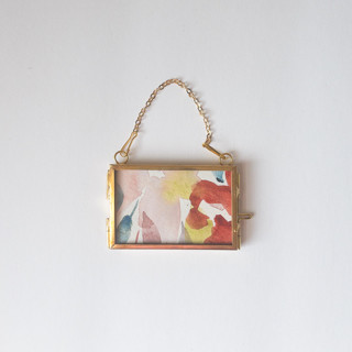 This is a multicolor holiday decorations by Jocelyn Elizabeth called watercolor floral framed ornament 6 in standard
