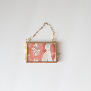 This is a red holiday decoration by Jocelyn Elizabeth Studio called Watercolor Floral Framed Ornament 5 in standard.