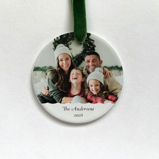 This is a white holiday decorations by Holly Whitcomb called personalized family photo ornament in standard