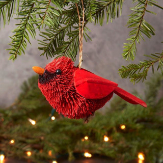 This is a red holiday decorations by Aahlada Chennupati called buri cardinal bird ornament in standard