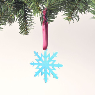 This is a multicolor holiday decorations by Em and Me Studio called iridescent snowflake ornament in standard
