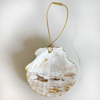 This is a gold holiday decorations by Nicoletta Savod called hand-painted natural seashell ornament, white, bronze & gold in standard