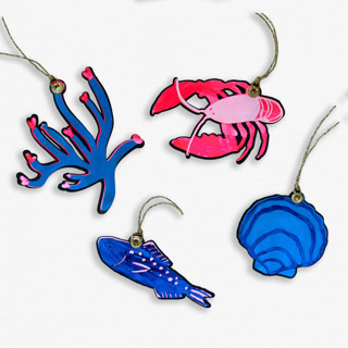 This is a multicolor holiday decorations by Lottie Aldarwish called paper cut out hand painted coastal ornaments - set of 4 in standard