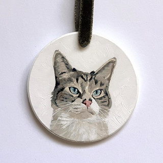 This is a multicolor holiday decorations by Holly Whitcomb called hand-painted pet portrait ceramic ornament in standard