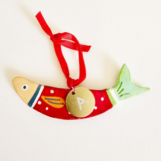 This is a red holiday decorations by AlisonJerry called personalize, hand-made clay red sardine ornament in standard