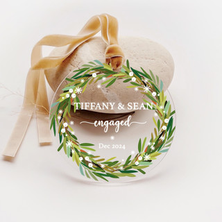 This is a green holiday decorations by Iveta Abolina called personalized acrylic green wreath engagement ornament, set of 1 in standard
