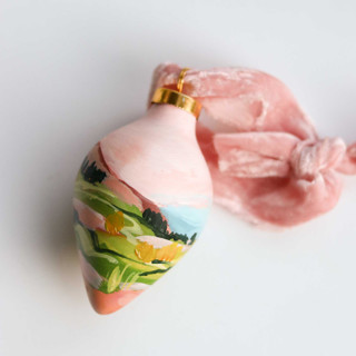 This is a pink holiday decorations by Weronika Zubek called pink colorado landscape - ornament 01 in standard