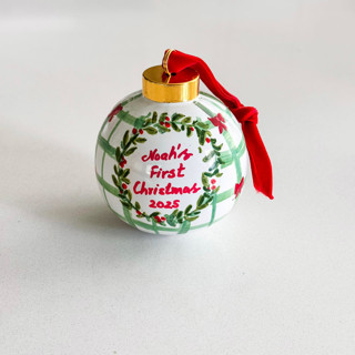 This is a green holiday decorations by Arohika Verma called personalized hand-painted “baby’s first christmas” ornament – red and green holiday design in standard