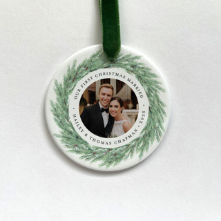 This is a multicolorassorted-colors holiday decorations by Holly Whitcomb called personalized newlywed photo ornament - juniper wreath in standard