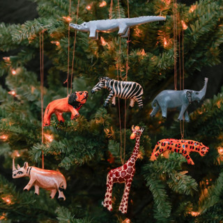 This is a multicolor holiday decorations by Aahlada Chennupati called painted wood safari animals ornament set of 7 in standard