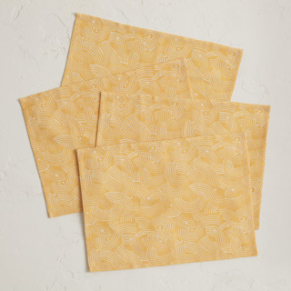 This is a golden table linens by Lise Gulassa called sunshine wave in standard