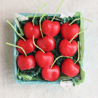 This is a multicolorassorted-colors party decorations by Happy Organics called cherry birthday beeswax candles in standard