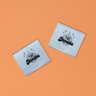 This is a silver party favors by ForYourParty called disco ball family name matchbooks, set of 50 in standard