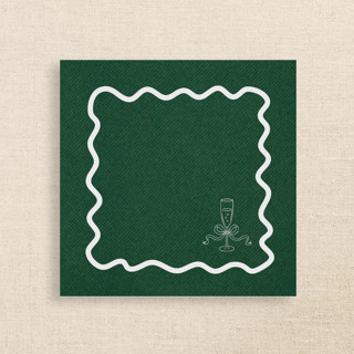 This is a green party decorations by Papel Custom Design called champagne glass with wavy border premium green cocktail napkins in standard