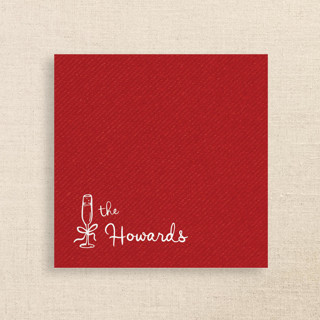 This is a red party decorations by Papel Custom Design called red linen-like napkin with personalized family name & champagne glass icon in standard