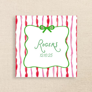 This is a multicolor party decorations by Papel Custom Design called fun holiday striped name personalized cocktail napkins in standard