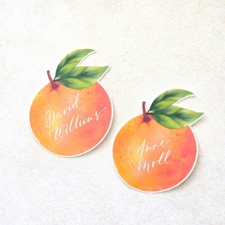 This is a orange party decorations by Inkspiringletters called watercolor orange place cards-personalized set of 10 in standard