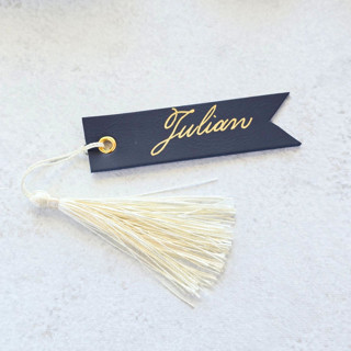 This is a blue party decorations by Inkspiringletters called faux leather tag with tassel-  personalized - set of 10 in standard
