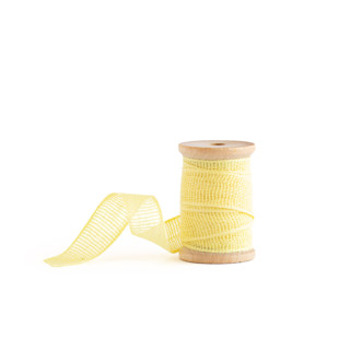 This is a lemon wedding ribbon by Minted called lemon loose weave cotton in standard