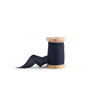 This is a navy wedding ribbon by Minted called navy shimmer in standard