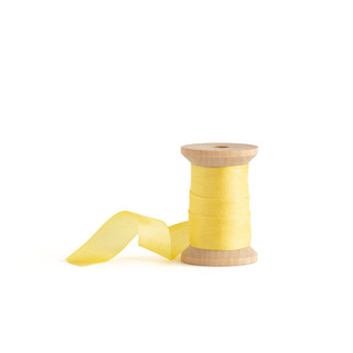 This is a lemon wedding ribbon by Minted called lemon shimmer in standard