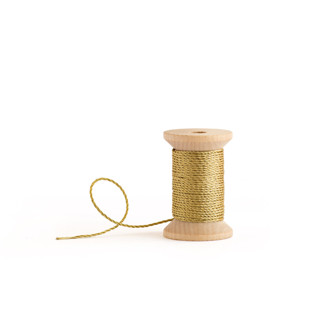 This is a gold wedding ribbon by Minted called Gold Metallic Cord in standard.