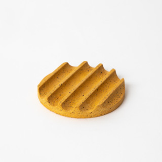 This is a yellow accent pieces by Pretti.Cool called marigold terrazzo mini soap dish in standard