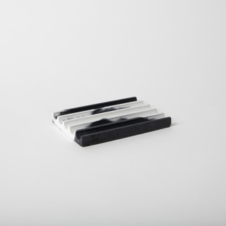 This is a black accent pieces by Pretti.Cool called cookies n cream soap dish in standard