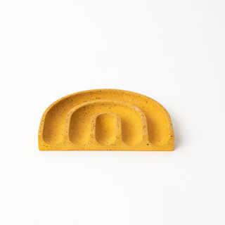 This is a yellow accent pieces by Pretti.Cool called marigold terrazzo sponge rest in standard