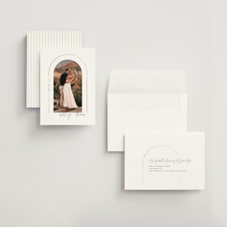 This is a silk foil stamped save the date cards with foil pressed by Kelly Schmidt called arch printing on recycled smooth signature in grand