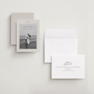 This is a dove foil stamped save the date cards with foil pressed by Rachelle Clarke called modern monogram printing on recycled smooth signature in grand