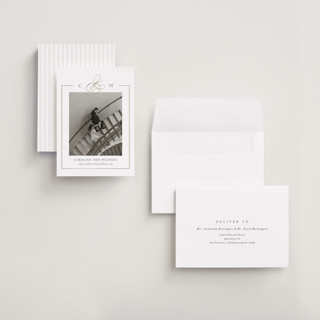 This is a silk foil stamped save the date cards with foil pressed by Kelly Schmidt called framed monogram printing on recycled smooth signature in grand