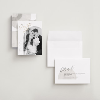 This is a snow foil stamped save the date cards with foil pressed by Pixel and Hank called capture printing on recycled smooth signature in grand