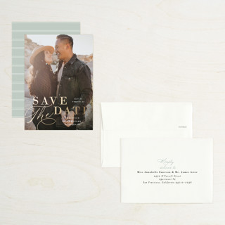 This is a cloud petite save the dates with foil pressed by Ashley Rosenbaum called composition printing on recycled smooth signature in petite