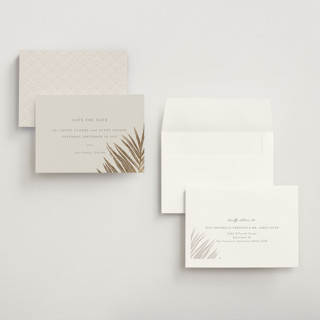 This is a sand petite save the dates with foil pressed by Melinda Denison called gilded palm printing on signature in petite