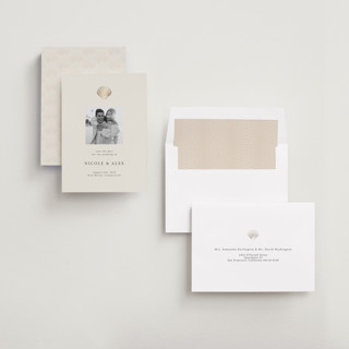 This is a sand foil stamped save the date cards with foil pressed by Hannah Bowman called simple seashell printing on recycled smooth signature in standard