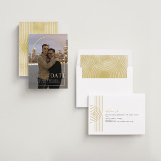 This is a cloud foil stamped save the date cards with foil pressed by silverscreen studio called deco arch printing on recycled smooth signature in standard