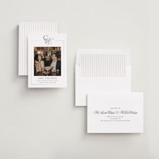 This is a silk foil stamped save the date cards with foil pressed by Kelly Schmidt called monogram script printing on recycled smooth signature in standard