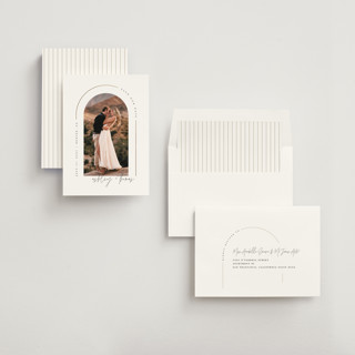 This is a silk foil stamped save the date cards with foil pressed by Kelly Schmidt called arch printing on recycled smooth signature in standard