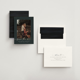 This is a midnight foil stamped save the date cards with foil pressed by Nicole Walsh called wrapped printing on recycled smooth signature in standard