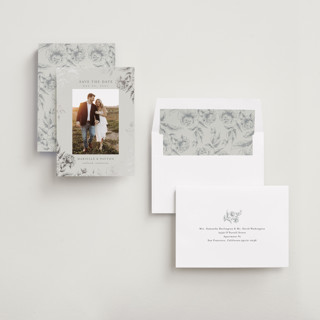 This is a steel foil stamped save the date cards with foil pressed by Chris Griffith called wildflower date printing on recycled smooth signature in standard