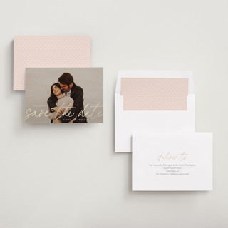 This is a blush foil stamped save the date cards with foil pressed by Sara Hicks Malone called scripted printing on recycled smooth signature in standard