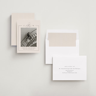 This is a linen foil stamped save the date cards with foil pressed by Kelly Schmidt called framed monogram printing on recycled smooth signature in standard