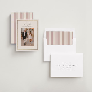 This is a ivory foil stamped save the date cards with foil pressed by Christy Hy Lee called refine frame printing on recycled smooth signature in standard