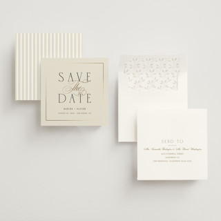This is a ivory foil stamped save the date cards with foil pressed by Ana Sharpe called heirloom union printing on signature in standard