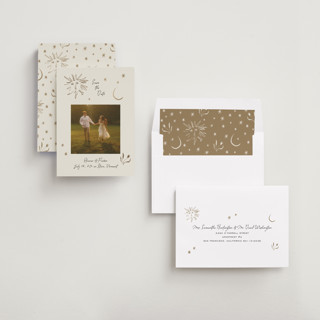 This is a champagne foil stamped save the date cards with foil pressed by Heather Schertzer called soleil printing on recycled smooth signature in standard