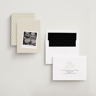 This is a linen foil stamped save the date cards with foil pressed by Lori Wemple called polaroid script printing on recycled smooth signature in standard